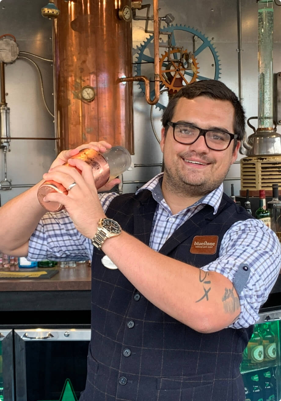 Bartender shaking a cocktail