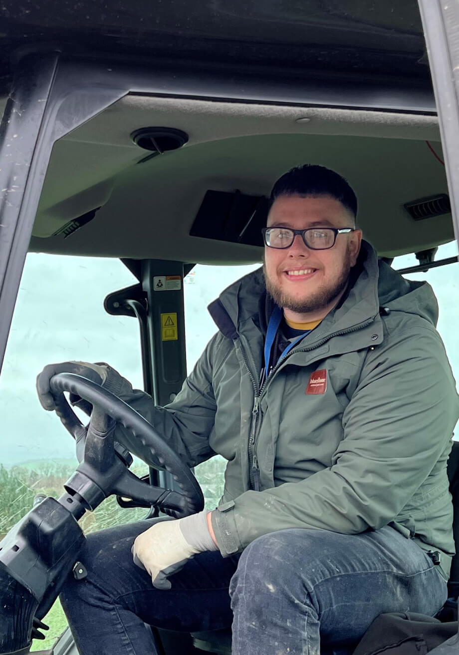 Man in a tractor smiling