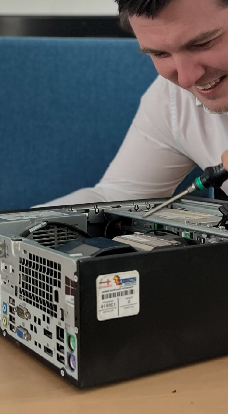 Man reparing a computer