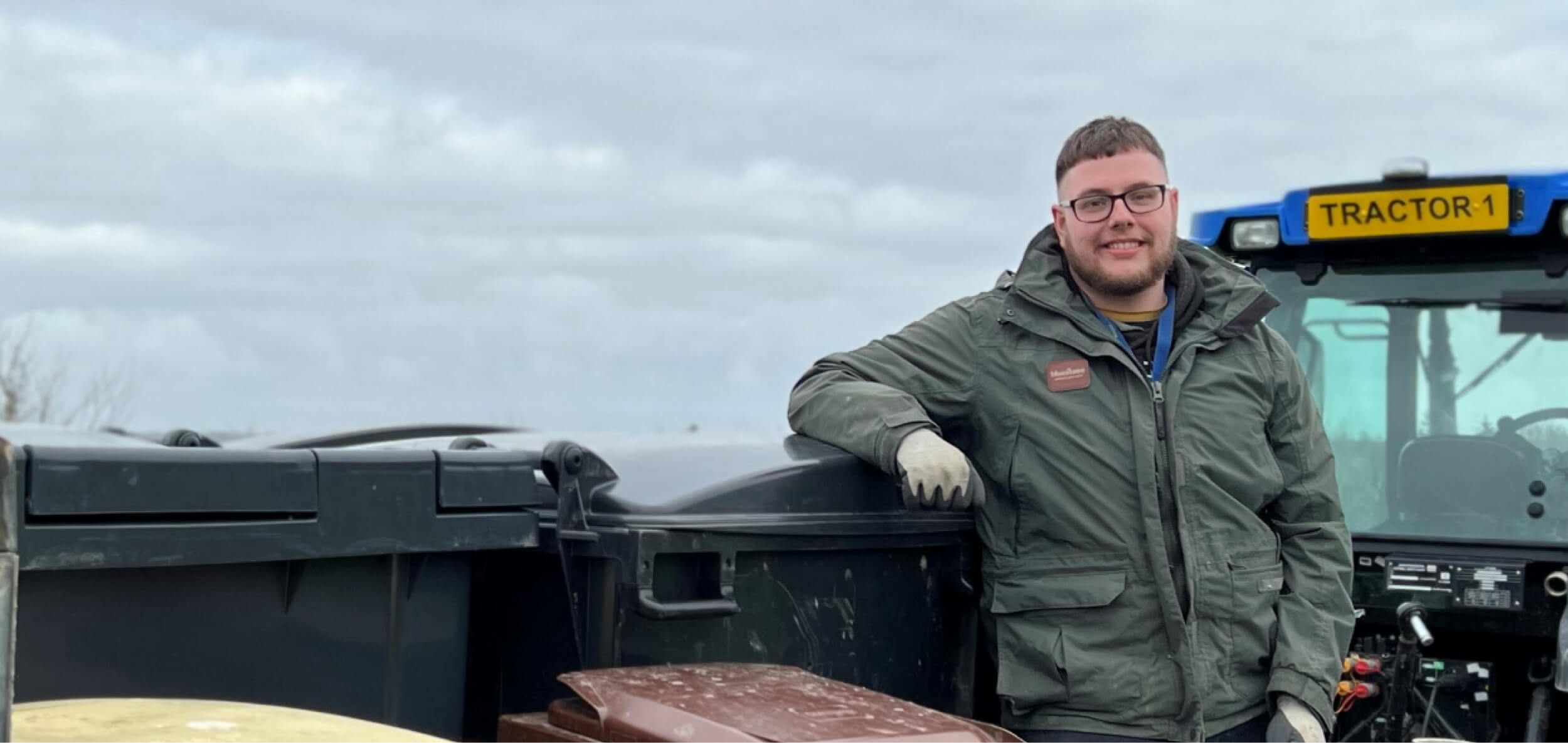 Man in the field smiling