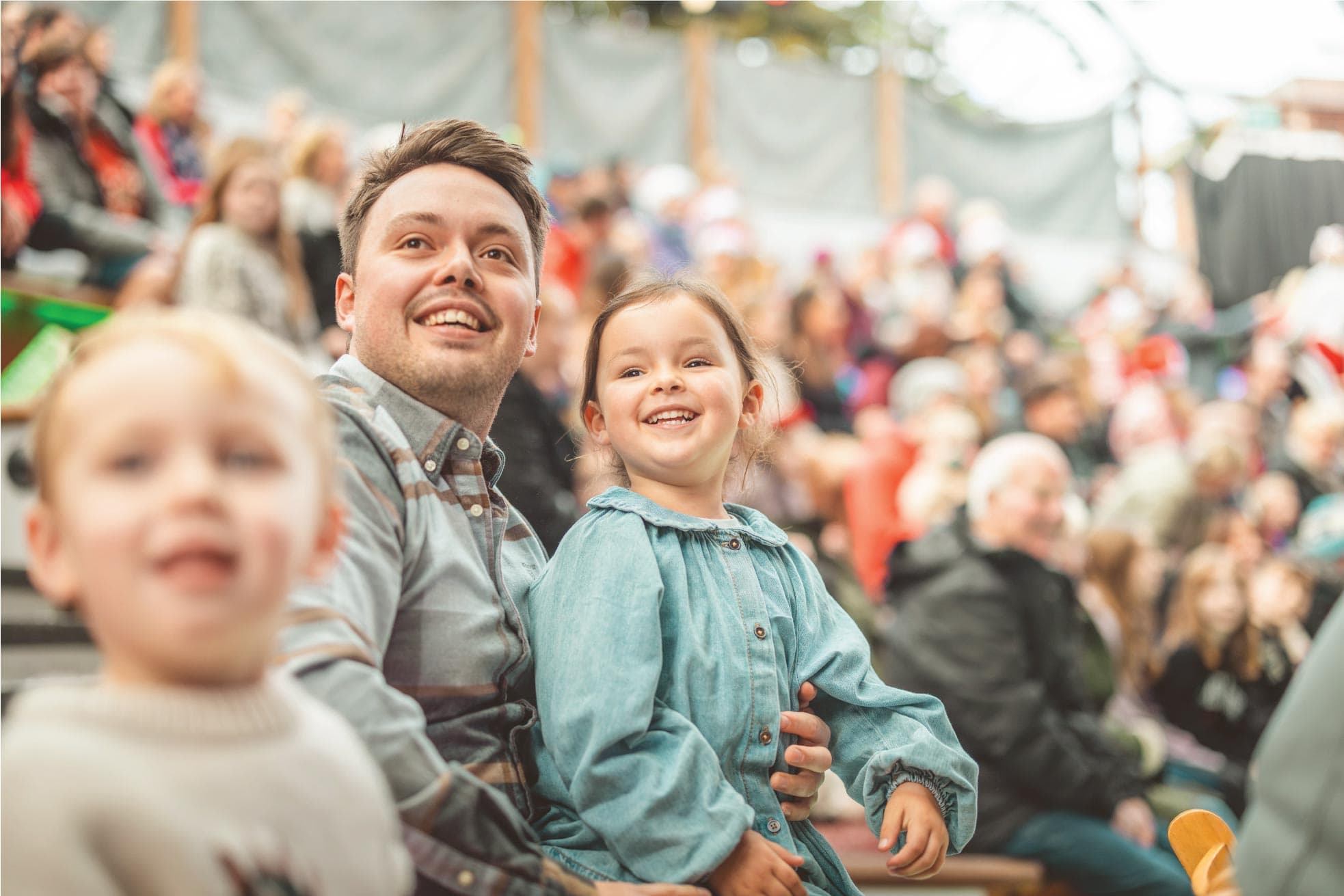 Family Watching Show In Cloud Theatre